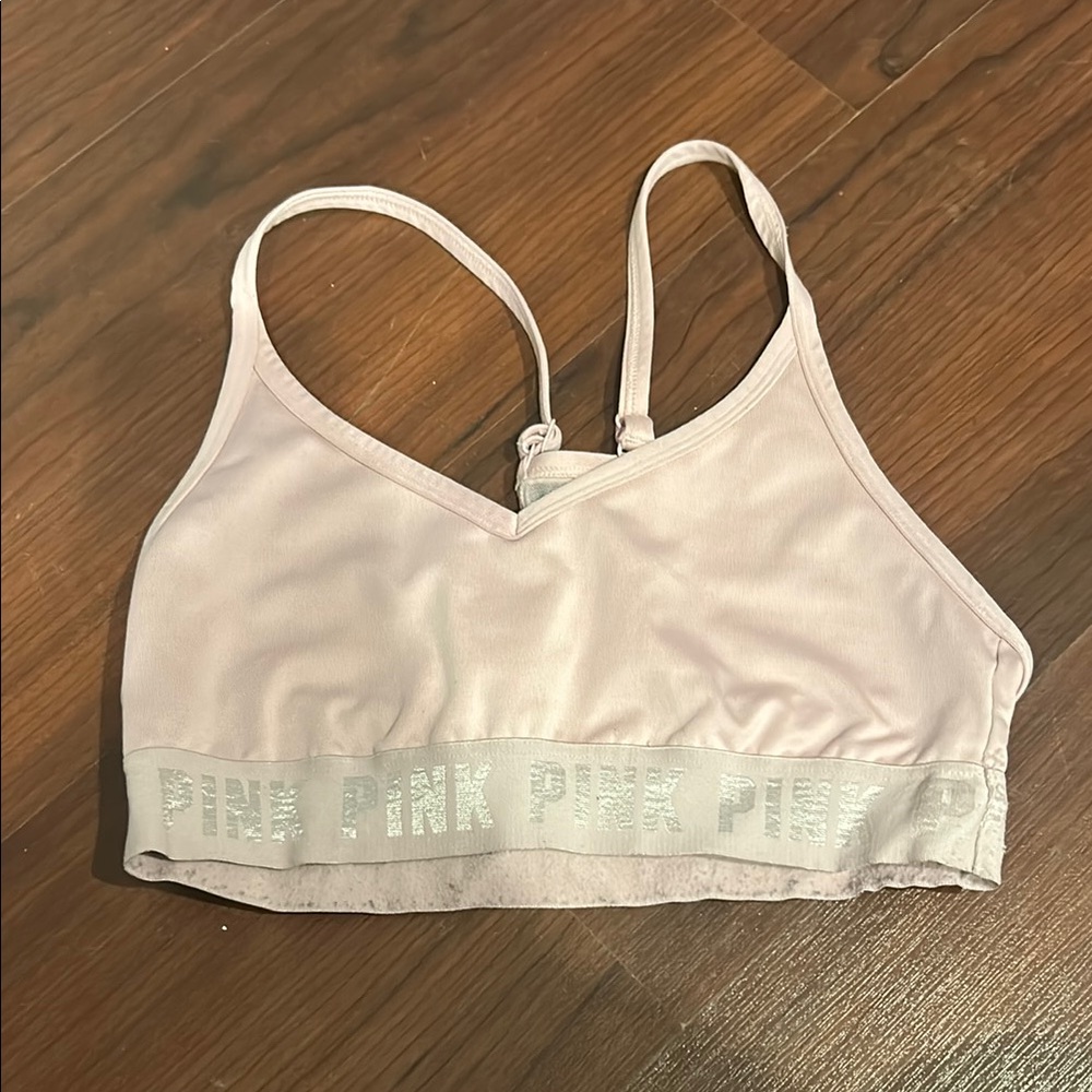 Pink Sports Bra with Racerback Design and Adjustable Straps